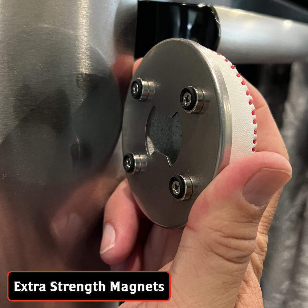 Hand holding a metallic object with 'Extra Strength Magnets' text