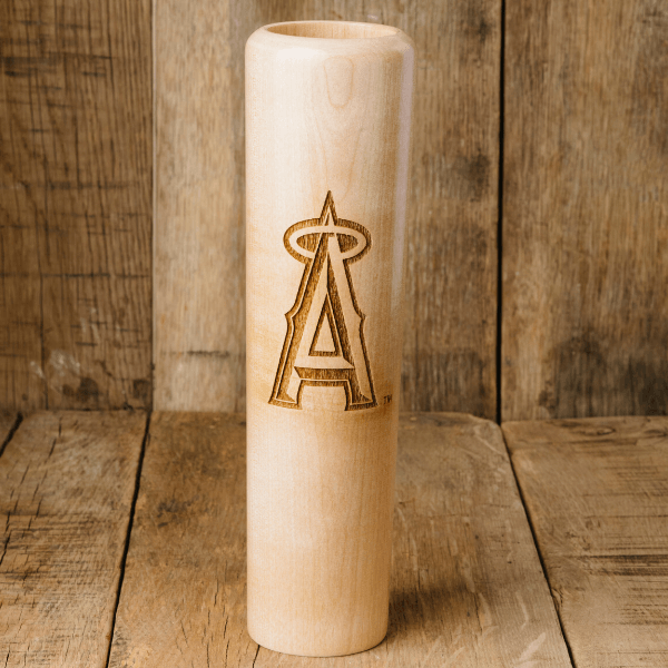 Wooden baseball bat with a logo on a wooden background