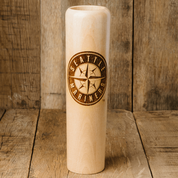 Wooden baseball bat with Seattle Mariners logo on a wooden background