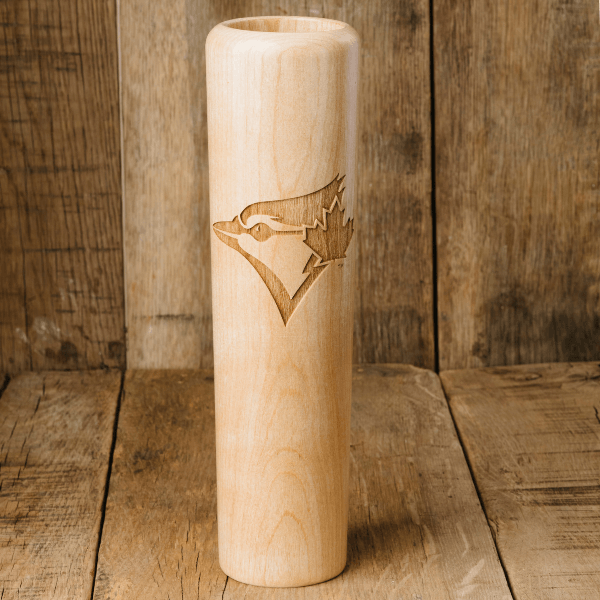 Wooden baseball bat with a logo on a wooden background