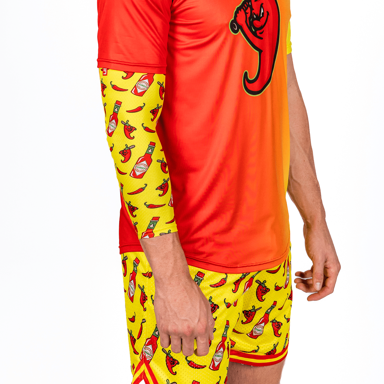 Collection of Person wearing a red and yellow outfit with hot pepper and ketchup pattern on a white background in a gallery layout