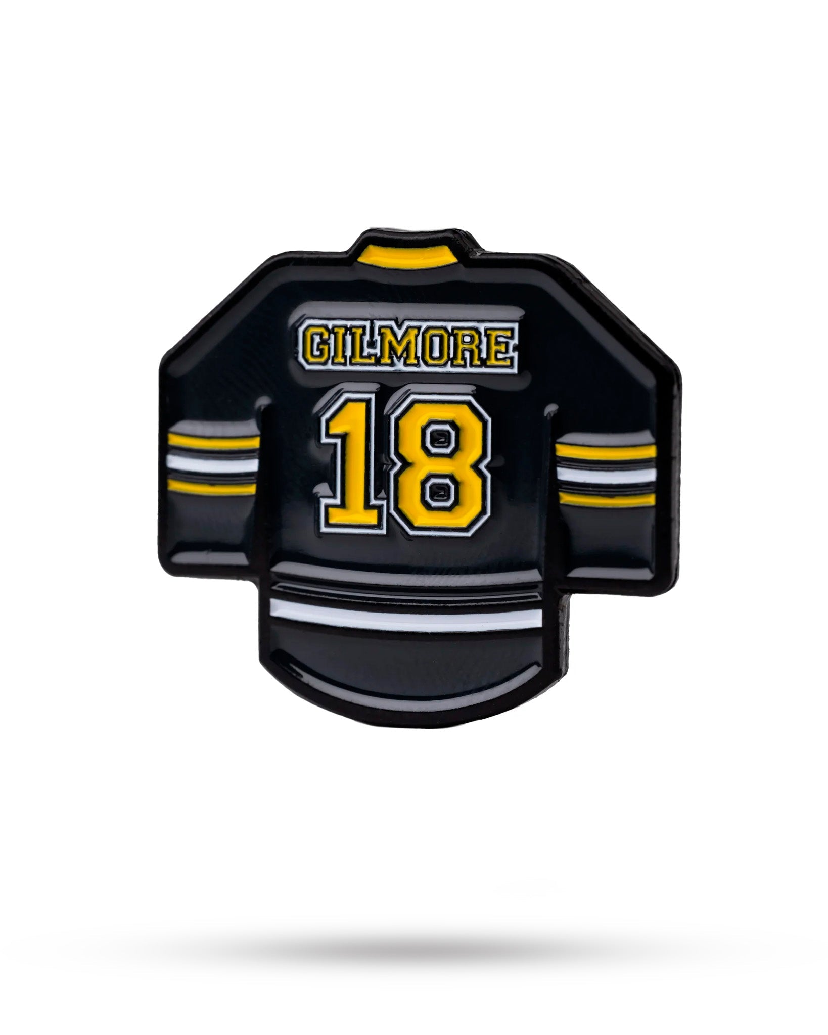 Collection of Black hockey jersey with 'Gilmore' and number '18' on a white background in a gallery layout