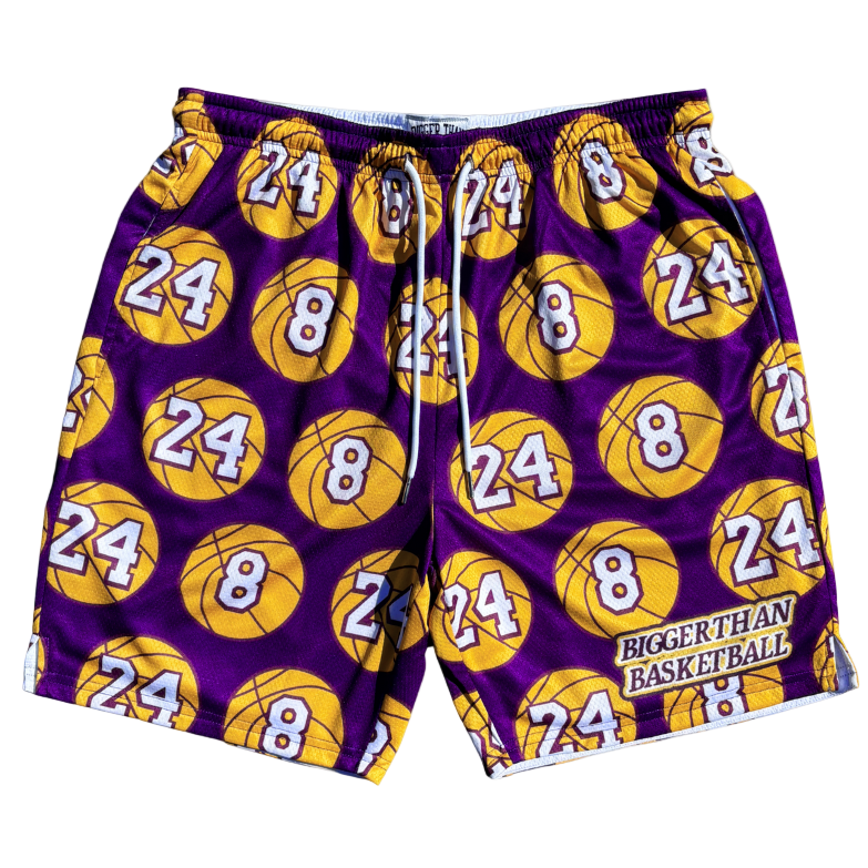 Collection of Purple shorts with yellow basketballs and numbers on a white background in a gallery layout