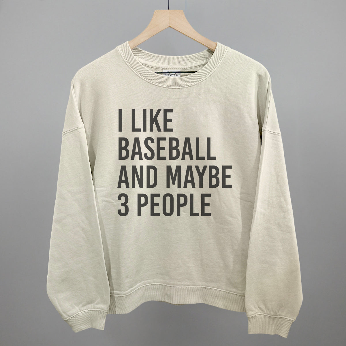 Collection of Bone sweatshirt with text 'I LIKE BASEBALL AND MAYBE 3 PEOPLE' on a gray background in a gallery layout