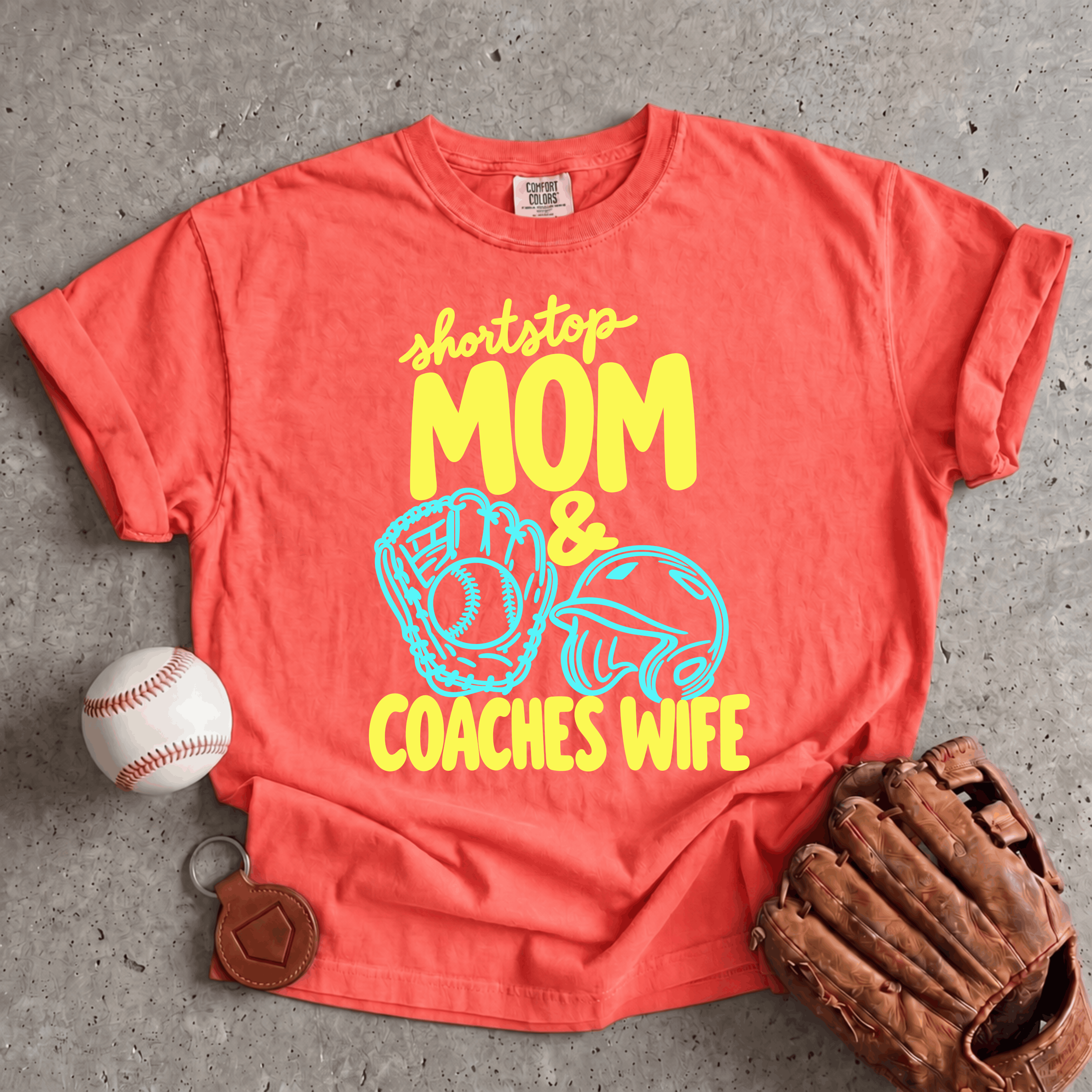 Collection of Shortstop Mom and Coach’s Wife Comfort Colors baseball T-shirt in bright salmon in a gallery layout