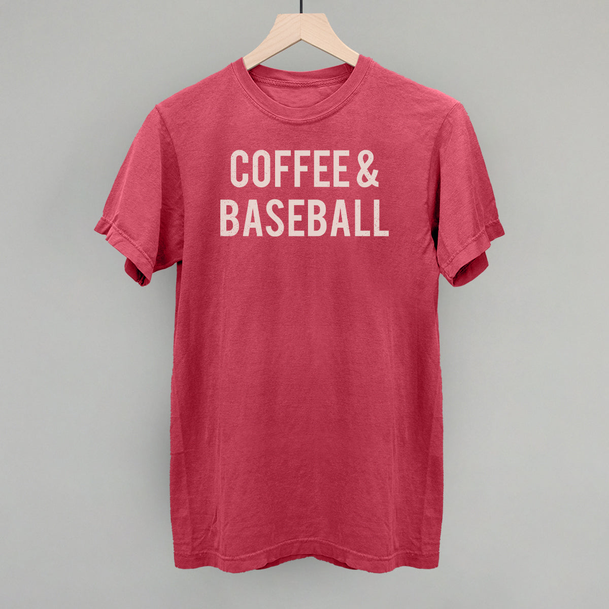 Red comfort colors t-shirt with 'COFFEE & BASEBALL' text on a gray background