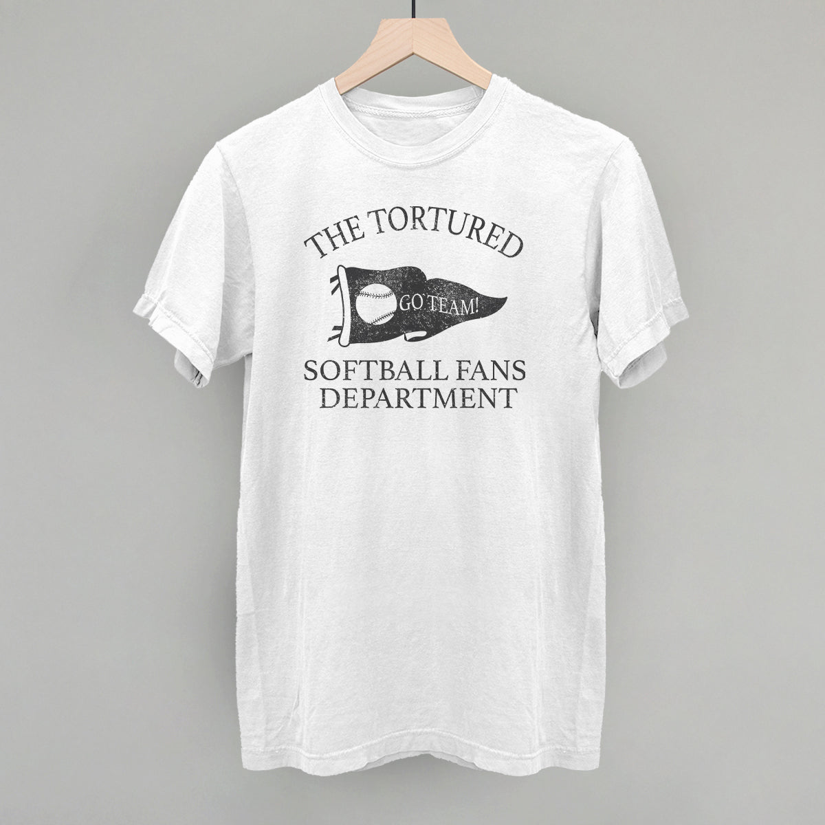 White t-shirt with black text that says the tortured Softball fans department 
