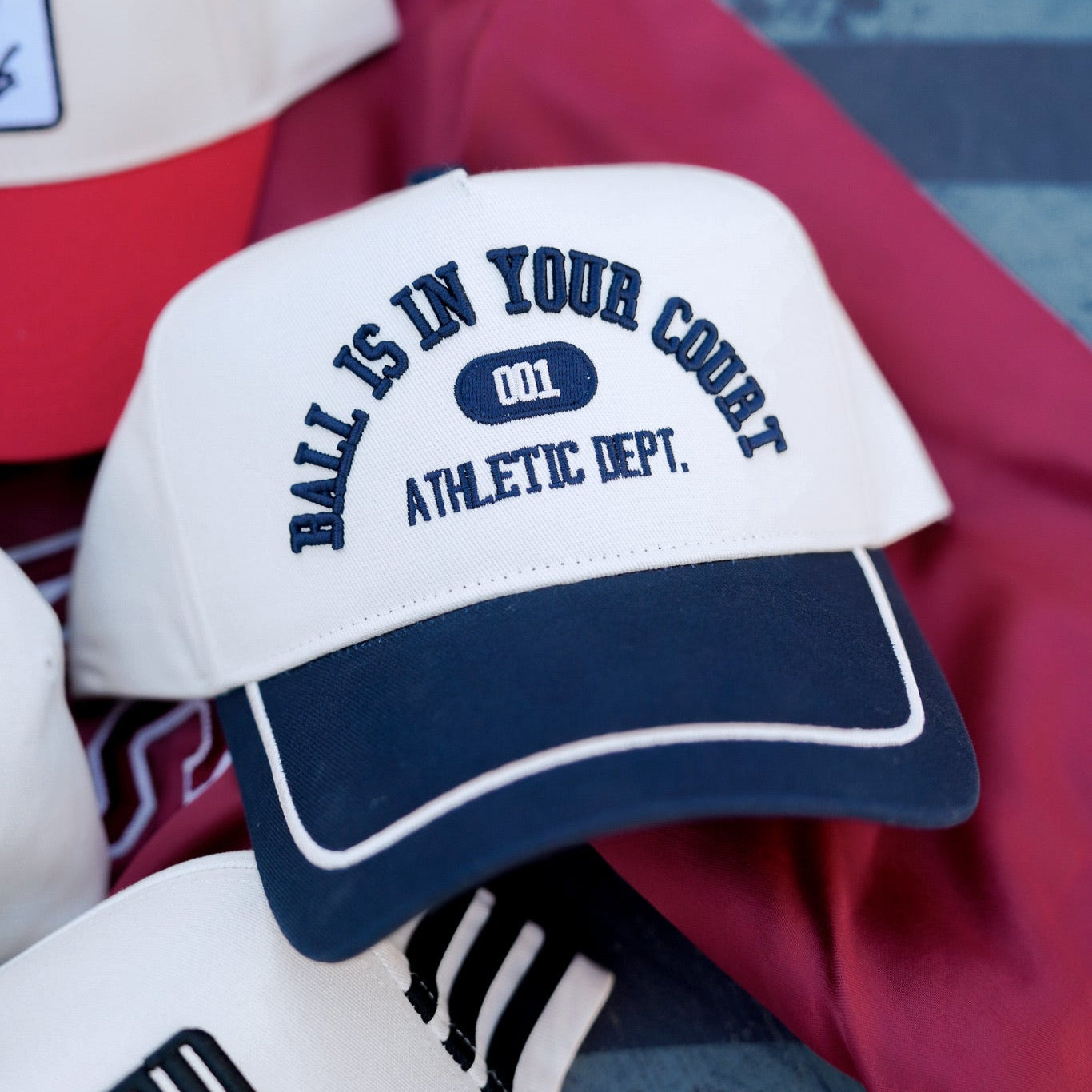 Hero: Ball Is In Your Court navy vintage trucker hat cream navy varsity embroidery Athletic Dept snapback sports hat