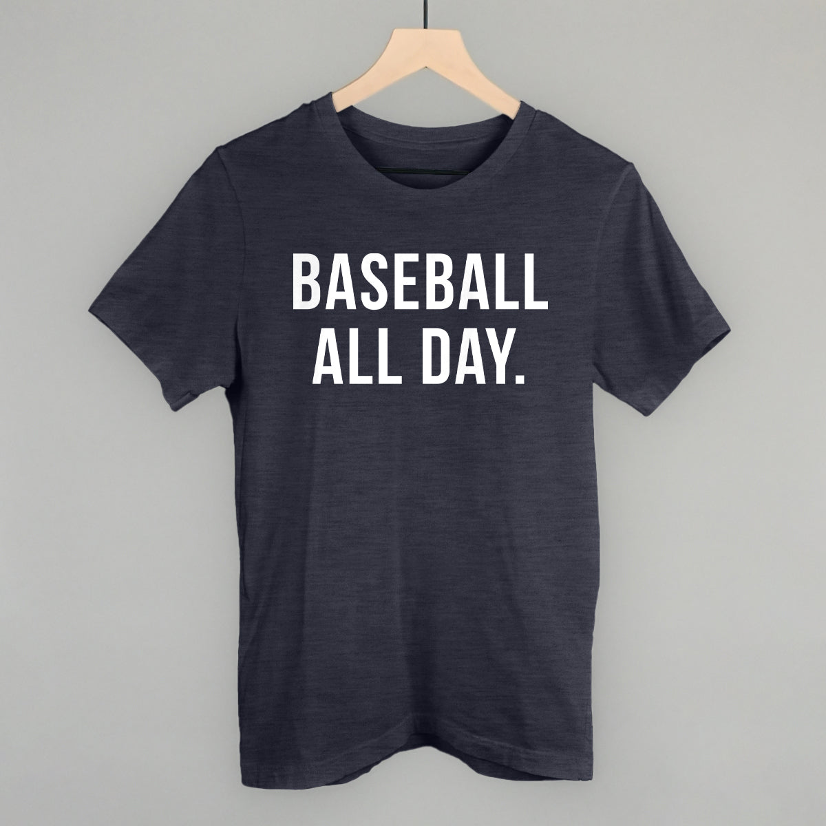 Navy t-shirt with 'BASEBALL ALL DAY.' text on a gray background