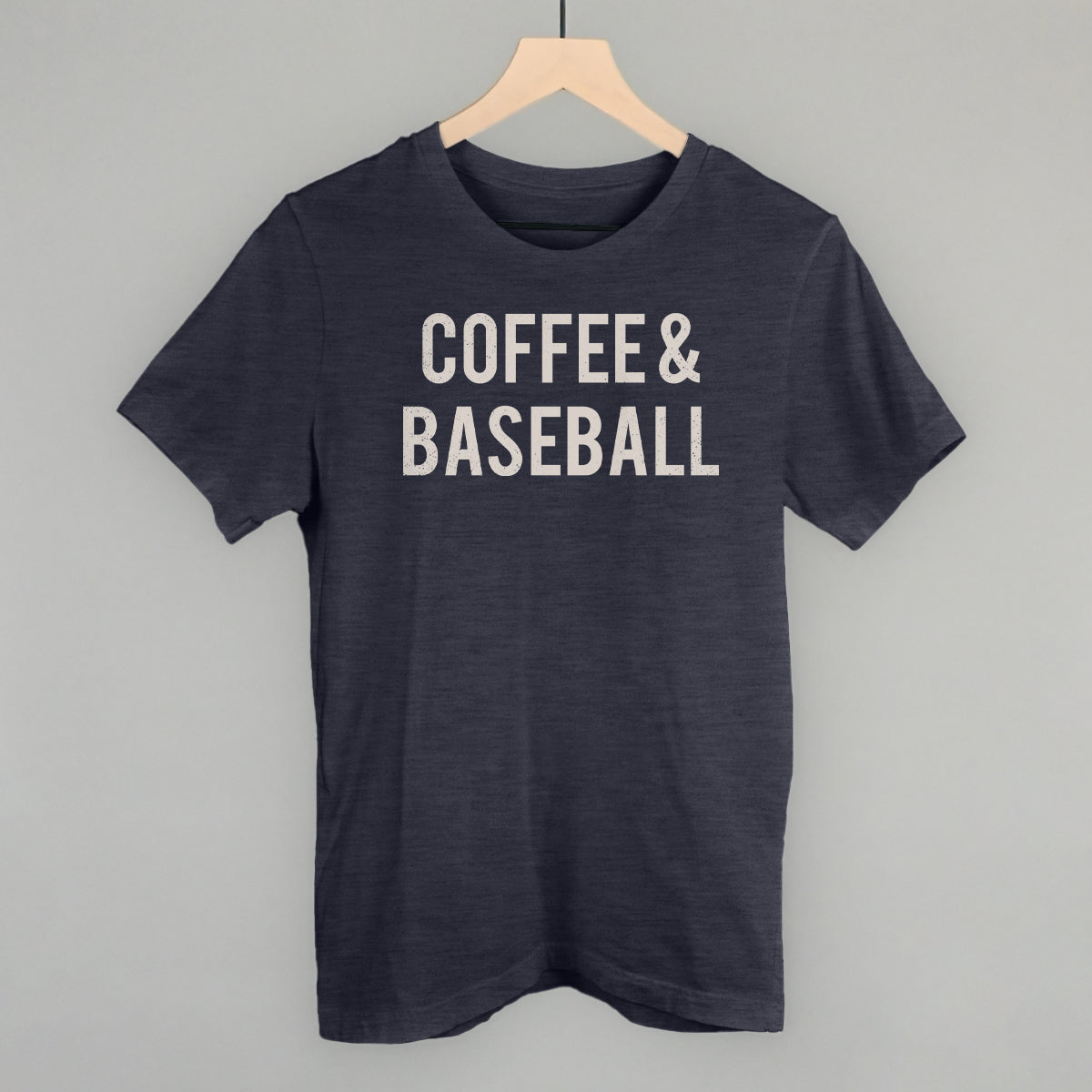Navy comfort colors t-shirt with 'COFFEE & BASEBALL' text on a gray background