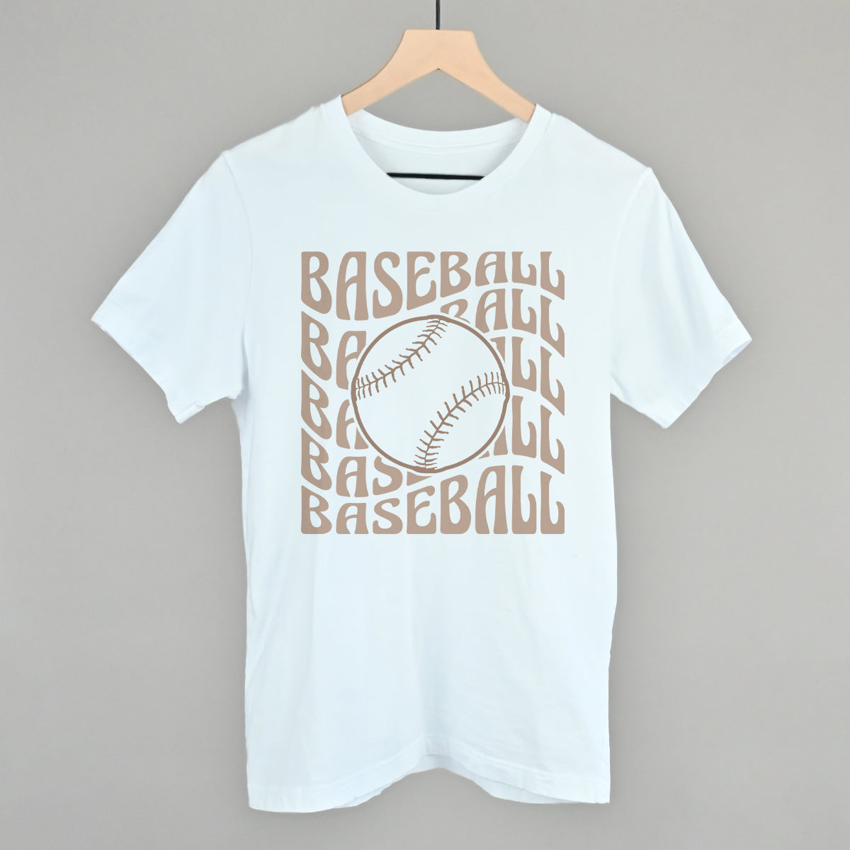 Collection of White t-shirt with 'BASEBALL' text and baseball graphic on a hanger against a gray background in a gallery layout