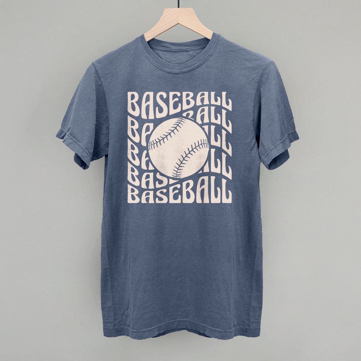 Blue t-shirt with 'BASEBALL' text and a baseball graphic on a gray background