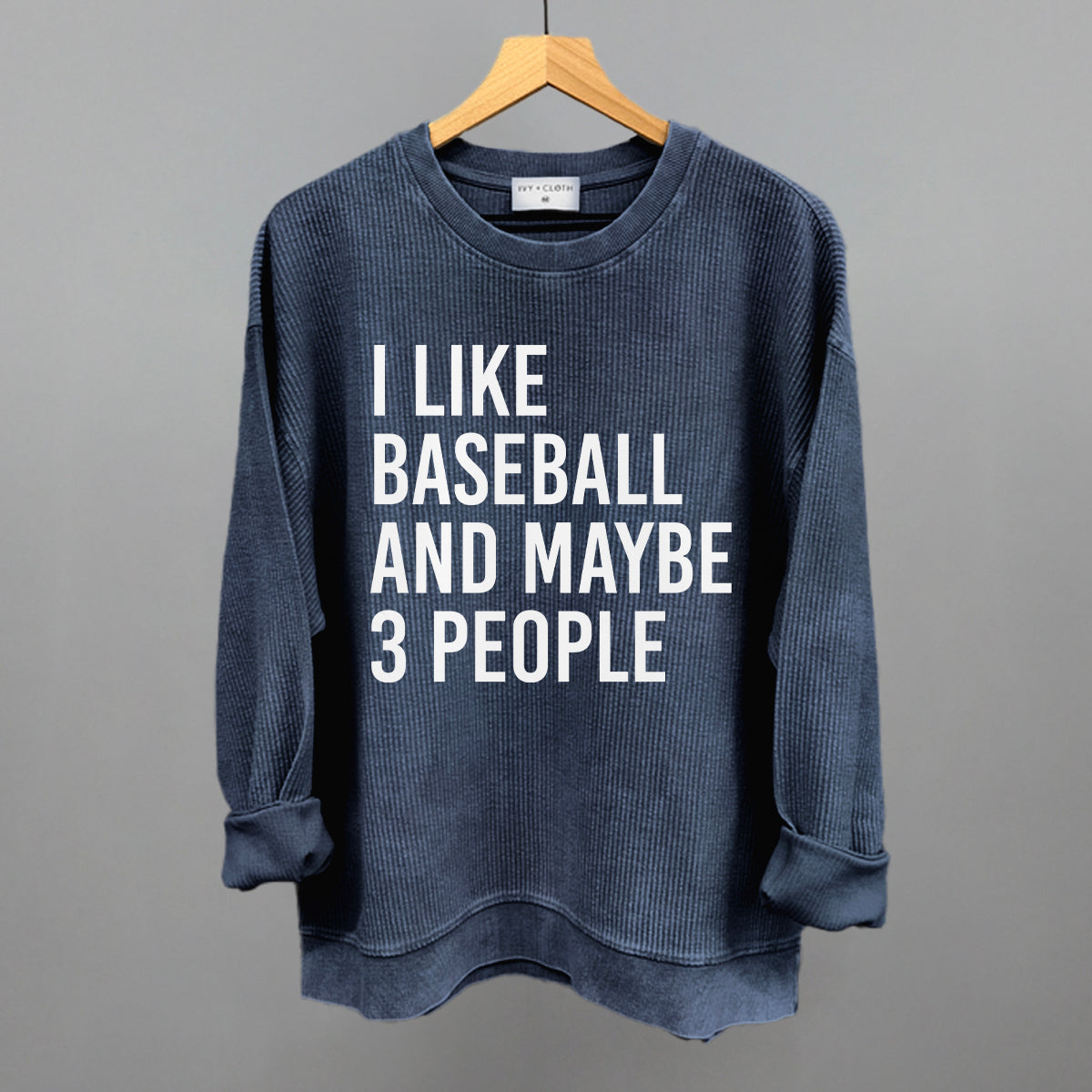 Corded Crew Navy Blue sweatshirt with text 'I LIKE BASEBALL AND MAYBE 3 PEOPLE' on a gray background
