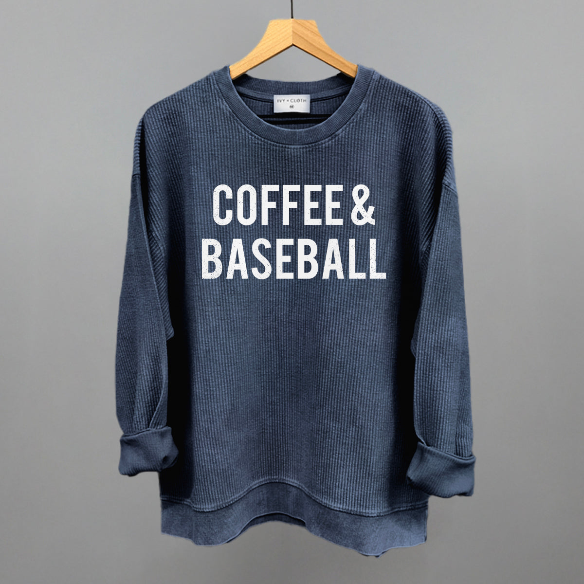 Collection of Navy comfort colors sweatshirt with 'COFFEE & BASEBALL' text on a gray background in a gallery layout