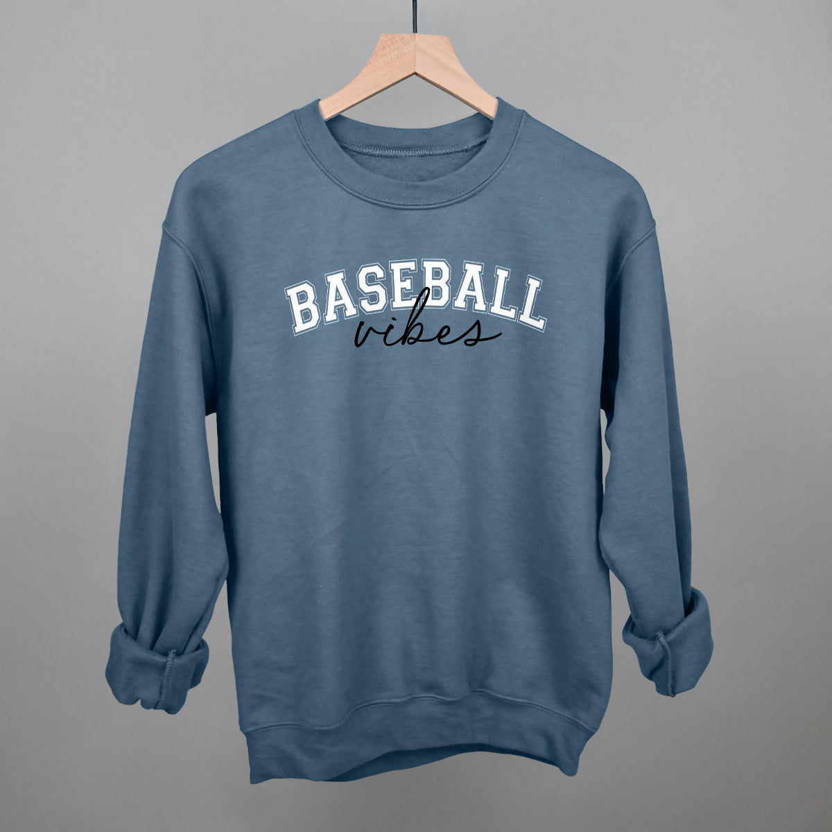 indigo Blue sweatshirt with 'BASEBALL vibes' text on a gray background