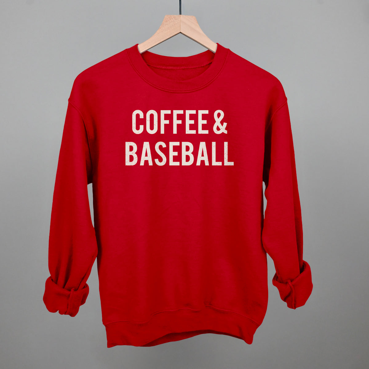 Red comfort colors sweatshirt with 'COFFEE & BASEBALL' text on a gray background