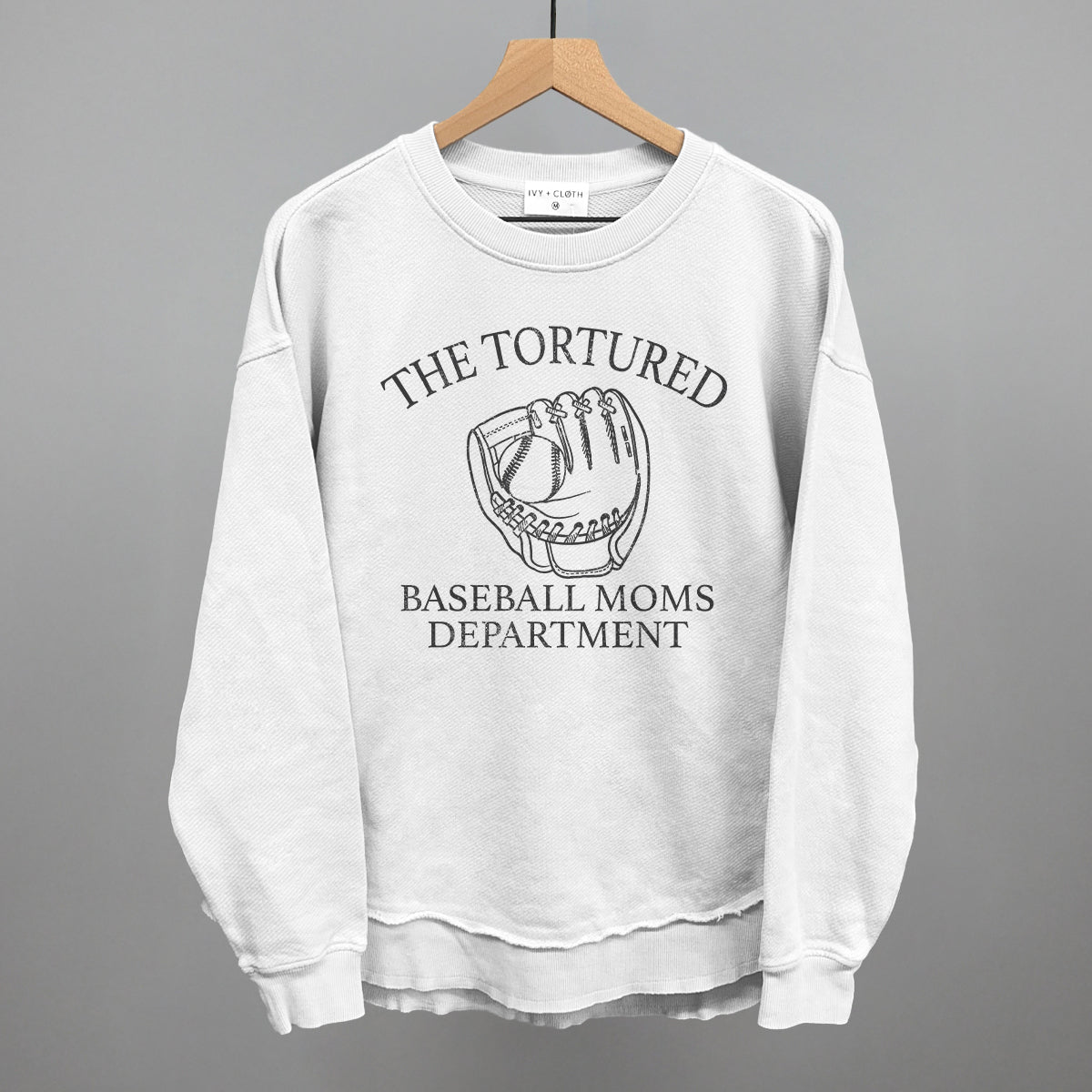 Collection of White sweatshirt with graphic and text on a hanger against a gray background in a gallery layout