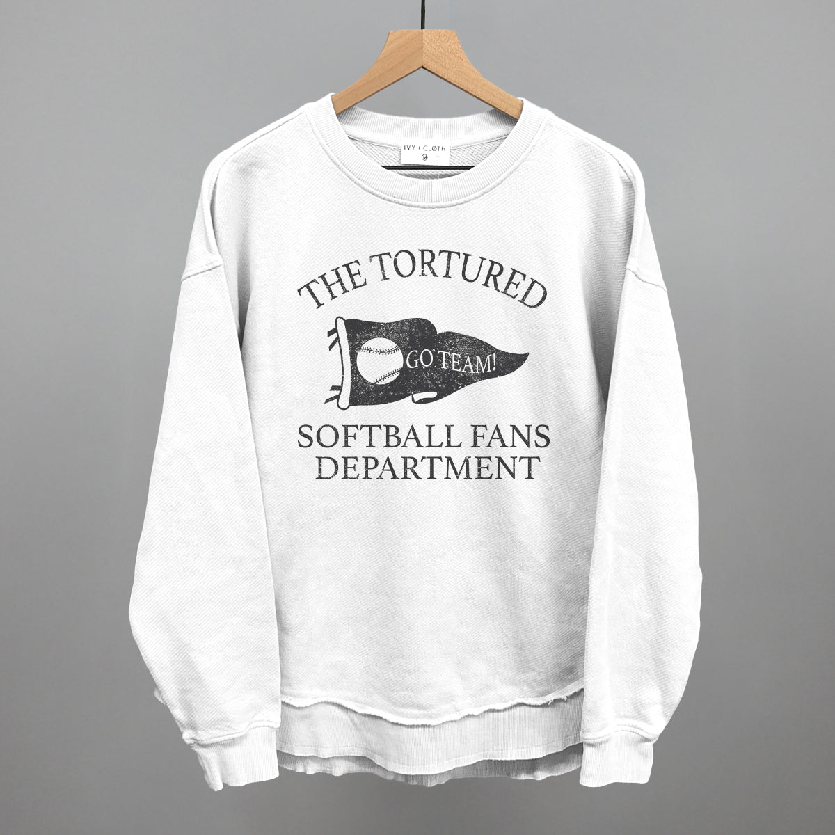 the tortured Softball fans department text on a white sweatshirt