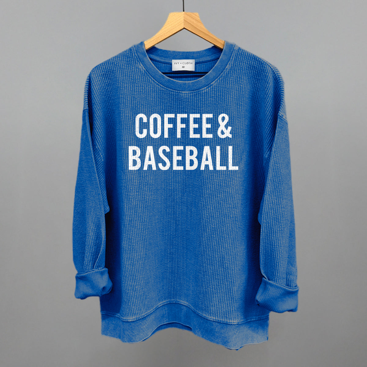 Collection of Blue corded crew sweatshirt with 'COFFEE & BASEBALL' text on a gray background in a gallery layout