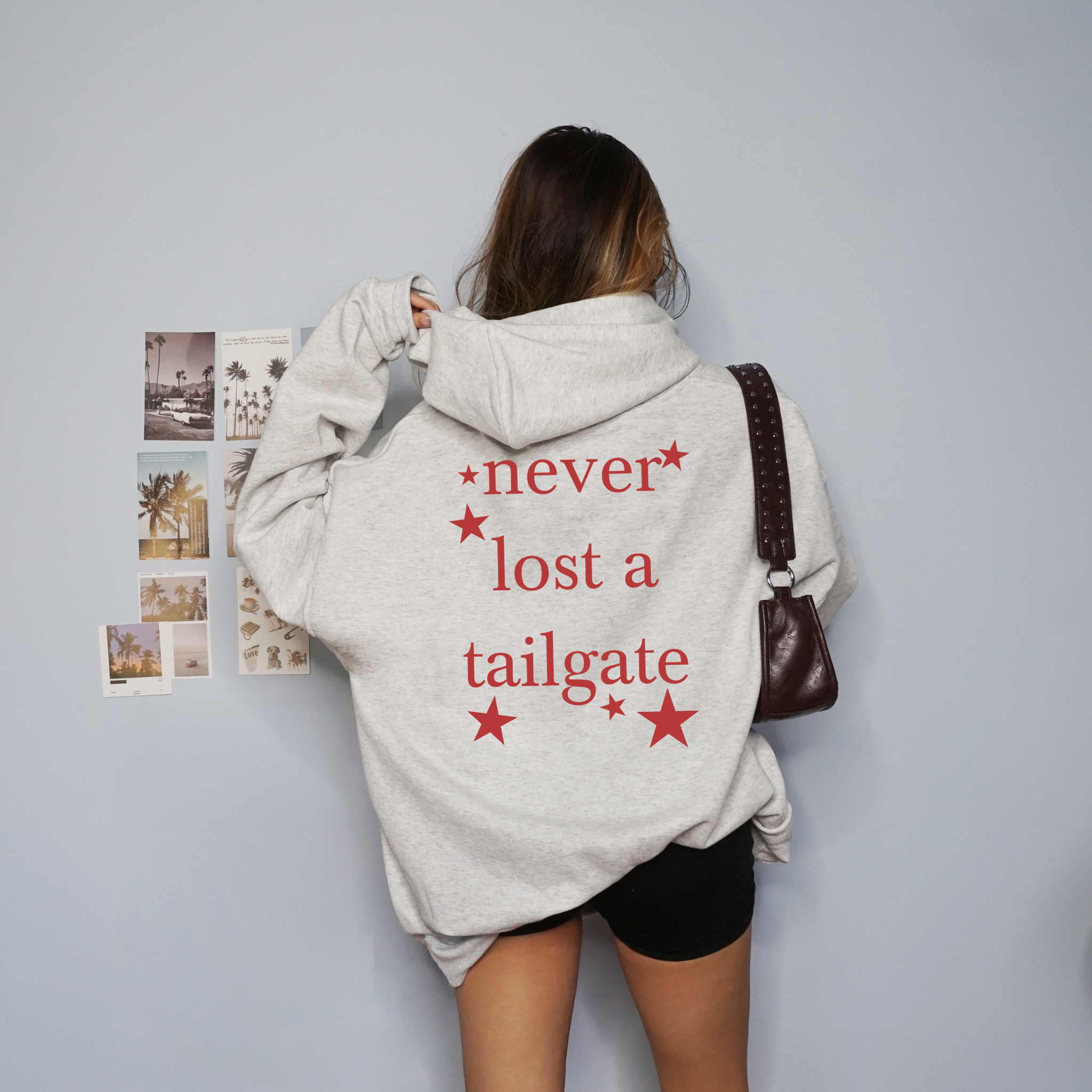 Collection of Never Lost A Tailgate Hooded Sweatshirt in a gallery layout