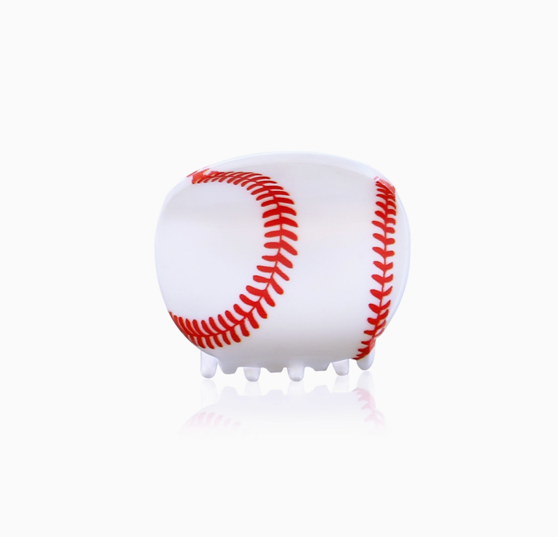 Baseball with red stitching on a white background