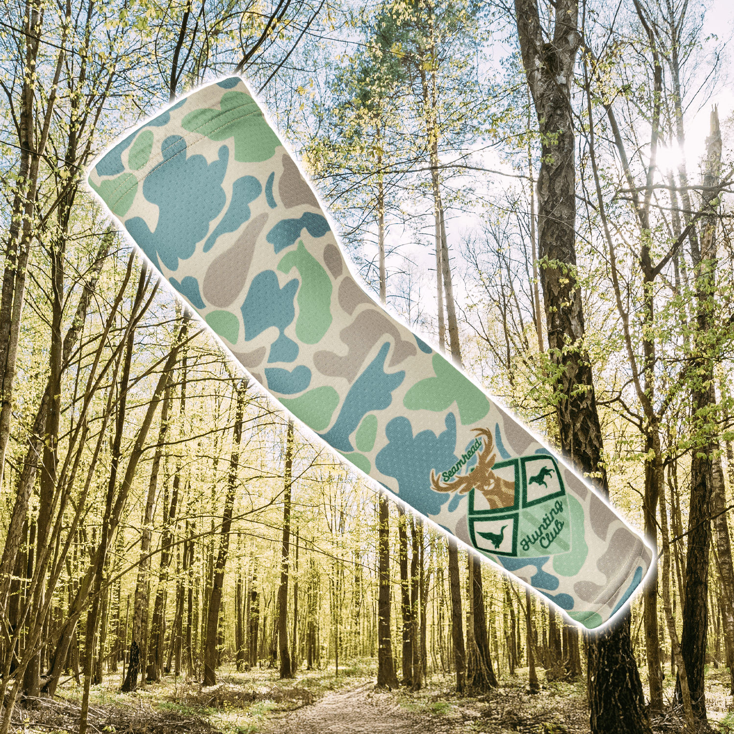 Collection of Camouflage-patterned product with a logo on a forest background in a gallery layout