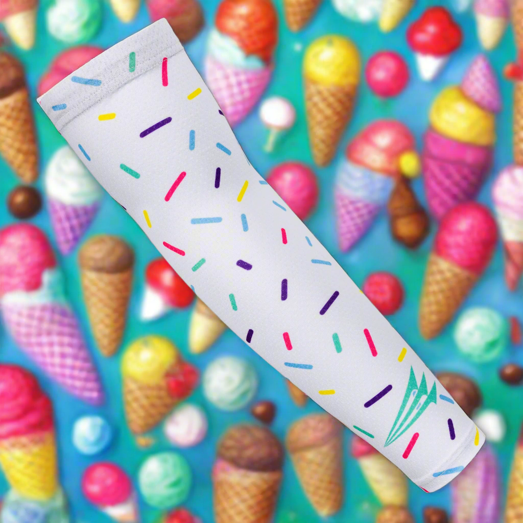 Collection of White tube with colorful sprinkles against a background of ice cream cones and colorful balls in a gallery layout