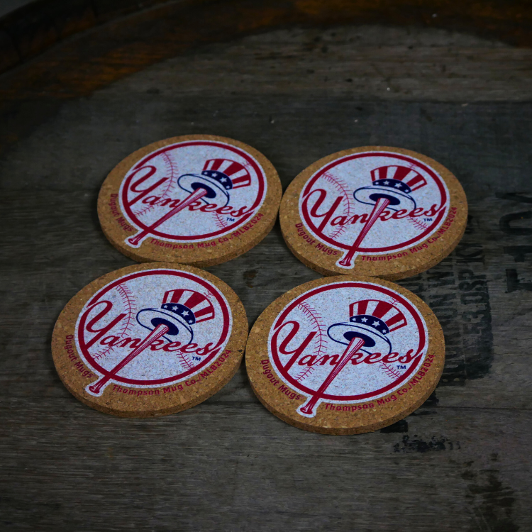 Collection of Four Yankees coasters on a wooden surface in a gallery layout