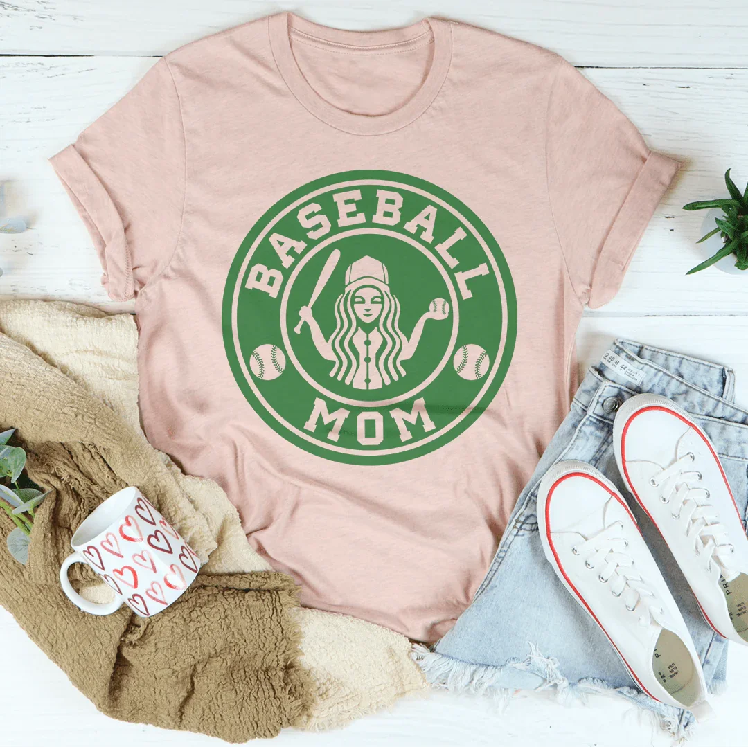 Collection of Pink t-shirt with 'Baseball Mom' graphic design on a white surface with accessories. in a gallery layout