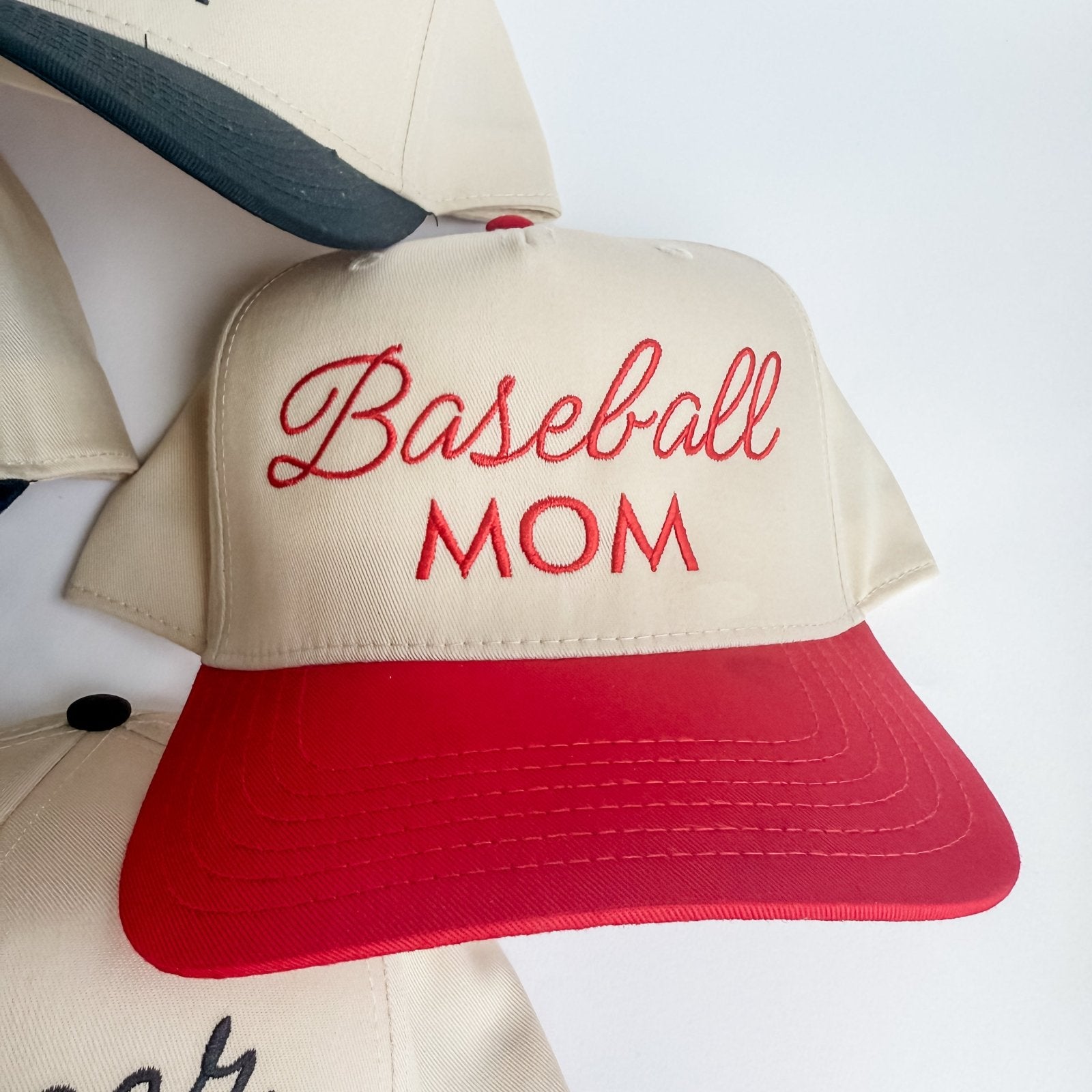 Collection of Baseball cap with 'Baseball Mom' text on a white background in a gallery layout