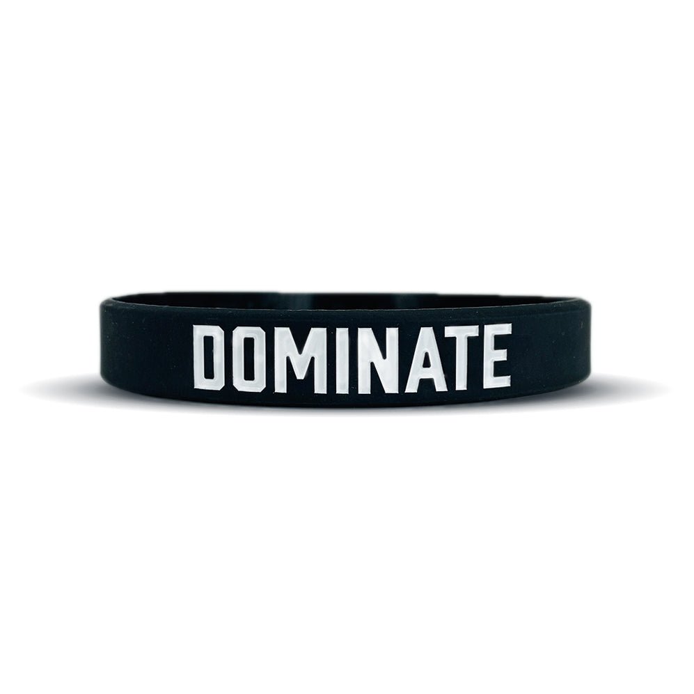 Collection of Black wristband with 'DOMINATE' text on a white background in a gallery layout