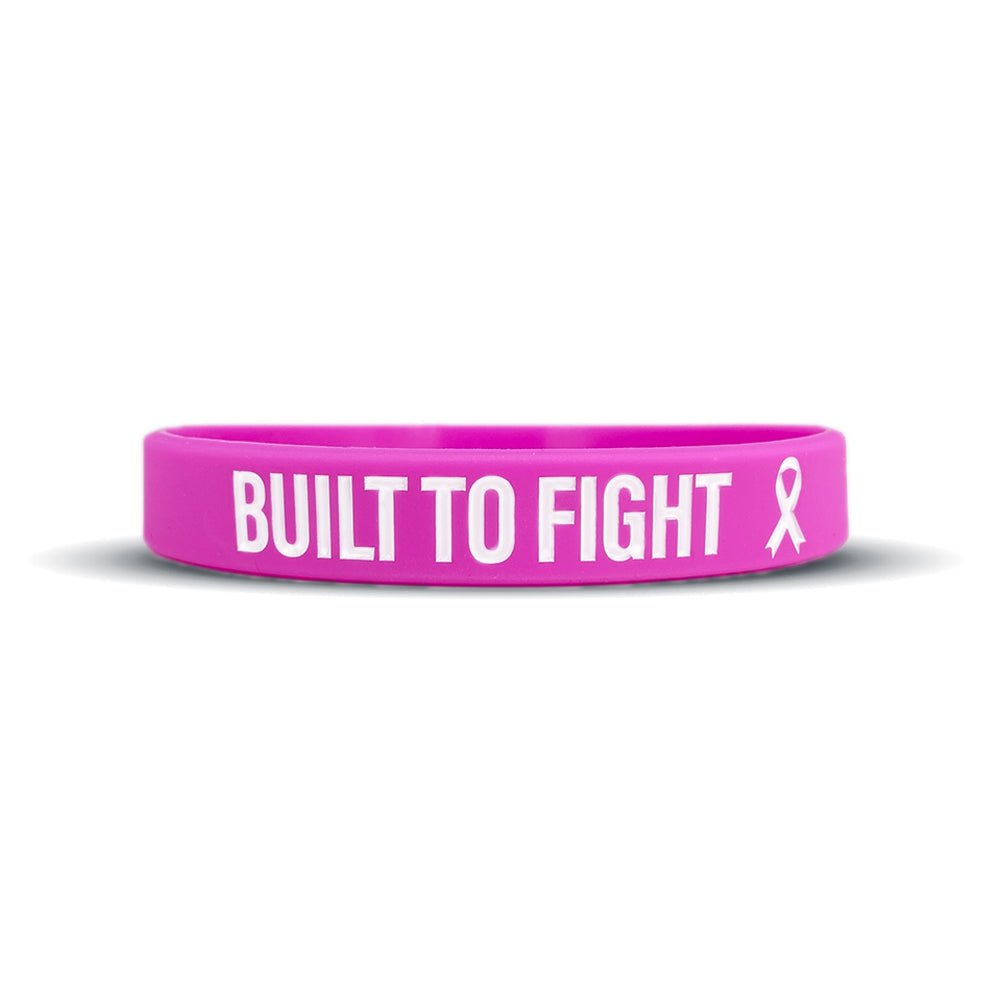 Collection of Pink wristband with 'BUILT TO FIGHT' text and a pink ribbon on a white background in a gallery layout