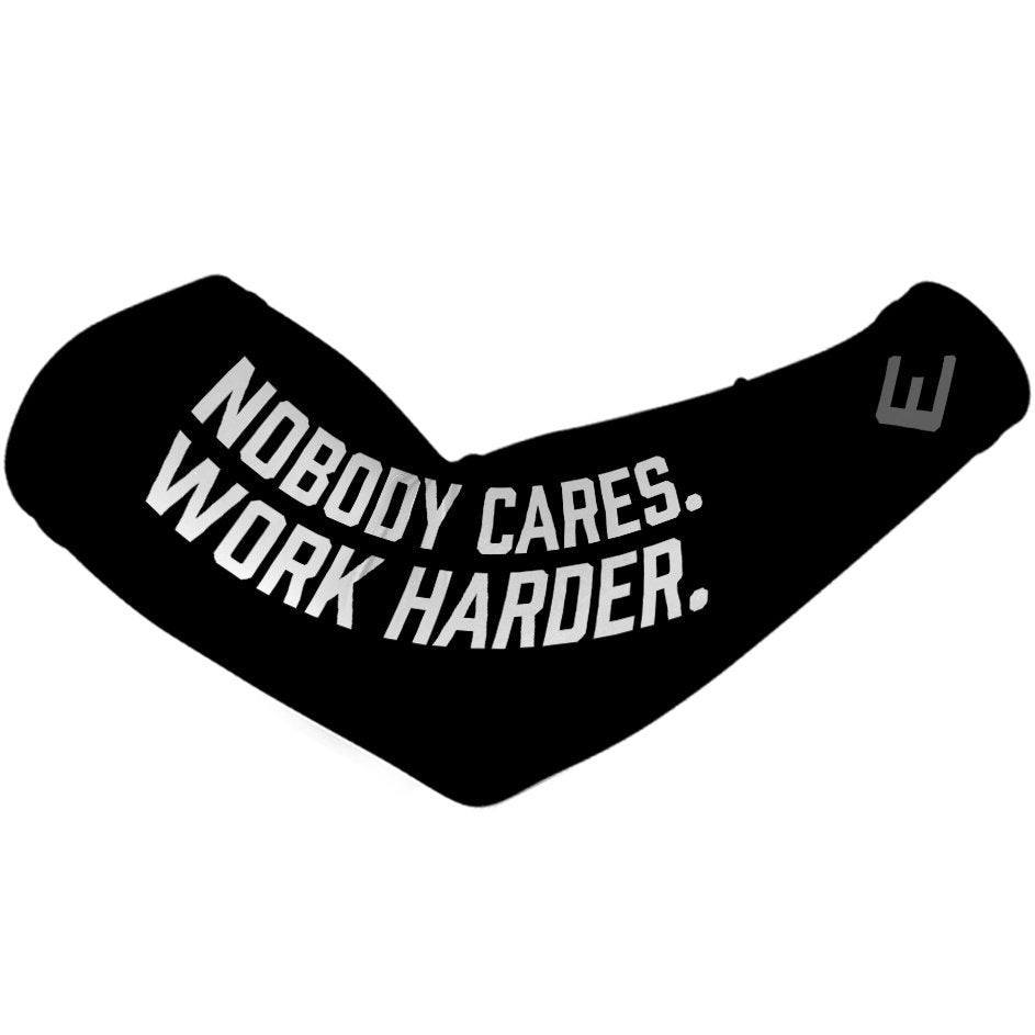 Collection of Black elbow pad with 'Nobody Cares. Work Harder.' text on a white background in a gallery layout