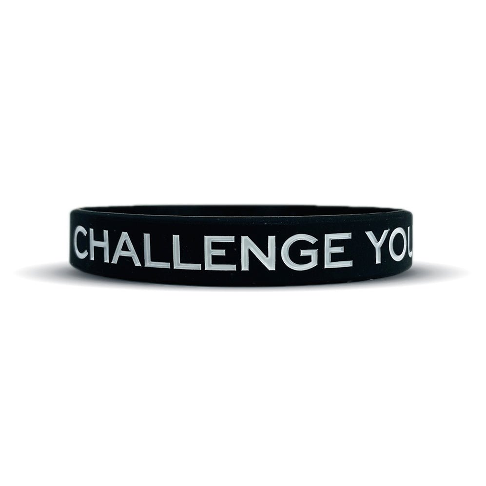 Collection of Black wristband with 'CHALLENGE YOU' text on a white background in a gallery layout