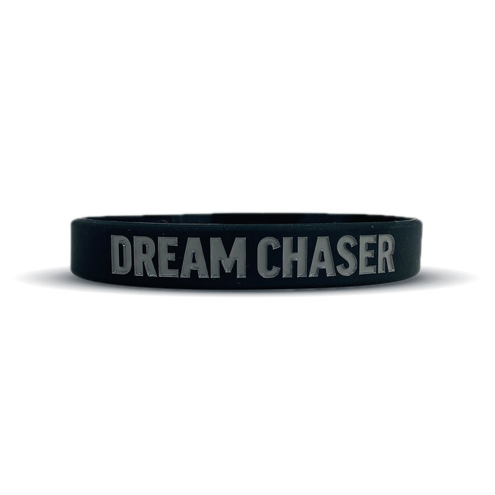 Collection of Black wristband with 'DREAM CHASER' text on a white background in a gallery layout