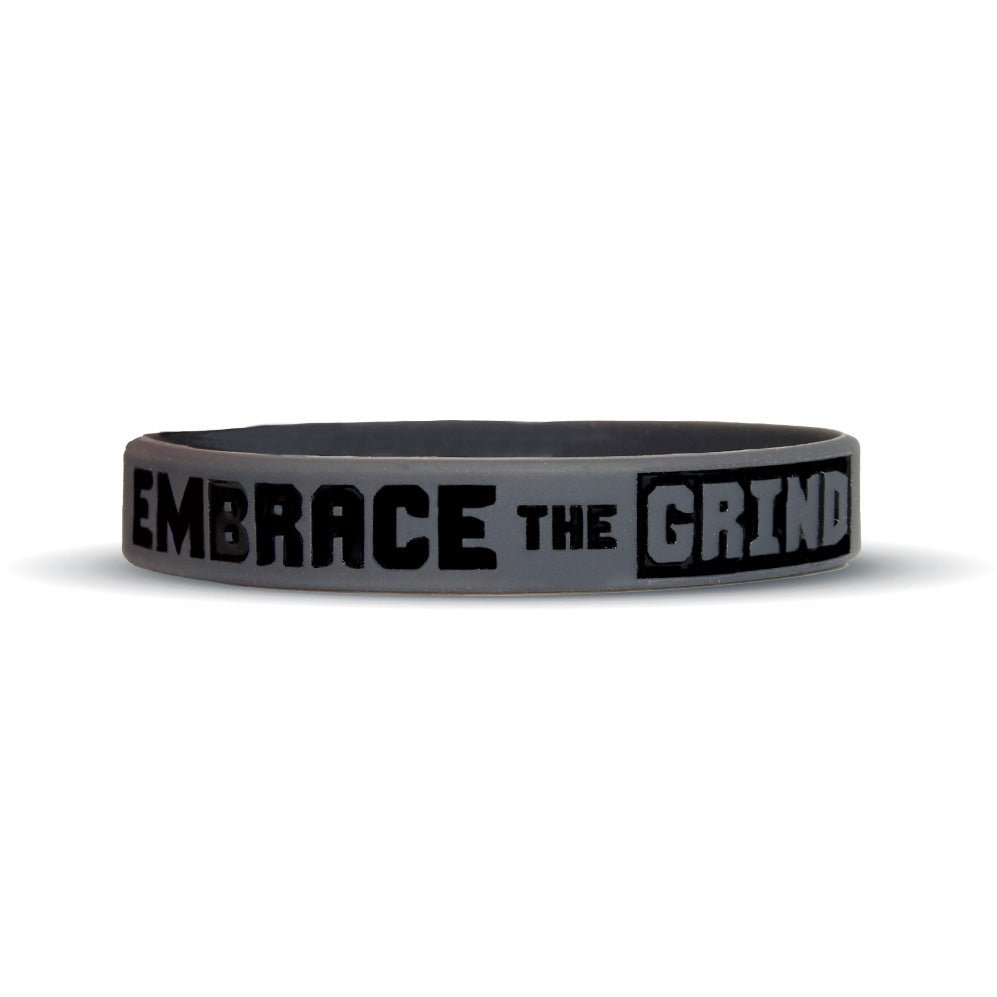 Collection of Gray wristband with 'Embrace the Grind' text on a white background in a gallery layout