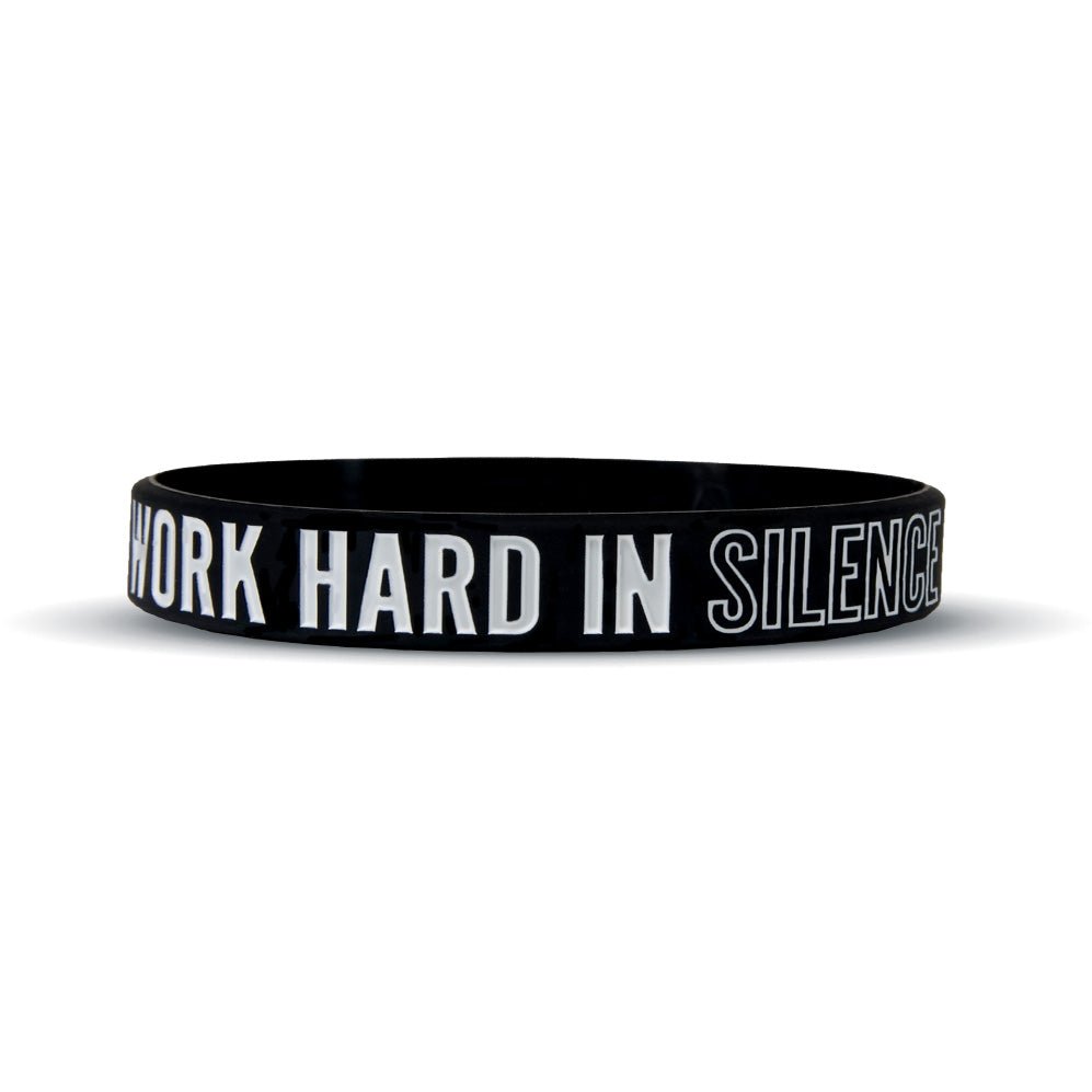 Collection of Black wristband with white text 'WORK HARD IN SILENCE' on a white background in a gallery layout